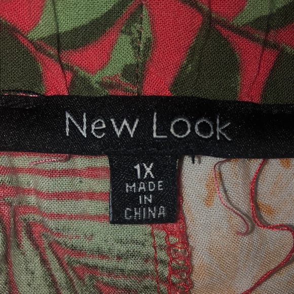 A pair of flowy shorts, a 1X and very colorful. From New Look - Picture 2 of 3